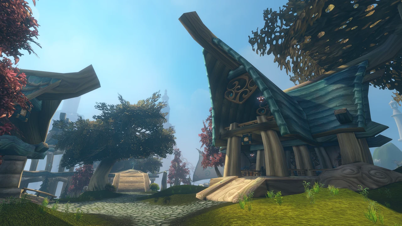 Elven houses with wooden roofs, a stone path and trees beneath the bright sky on Zephras.